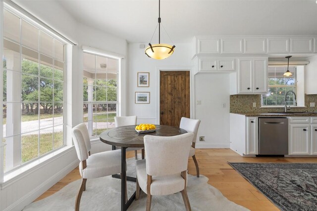 700 Longview Cir, Dripping Springs, TX 78620 - dining room featuring light wood finished floors