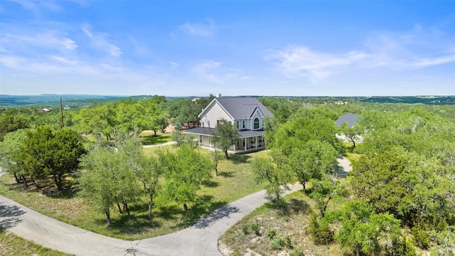700 Longview Cir, Dripping Springs, TX 78620 - view of subject property with a forest