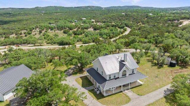 700 Longview Cir, Dripping Springs, TX 78620 - view from above of property with a forest