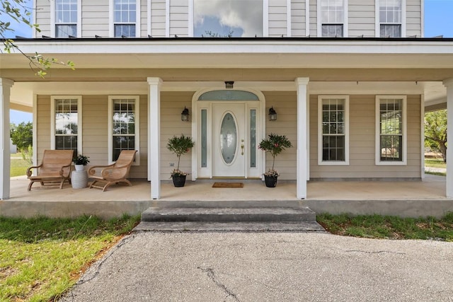 700 Longview Cir, Dripping Springs, TX 78620 - doorway to property with covered porch