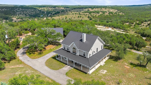 700 Longview Cir, Dripping Springs, TX 78620 - aerial view of property and surrounding area with a heavily wooded area