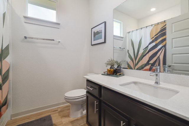 7812 City Top Blvd, Austin, TX 78724 - bathroom featuring wood finished floors, vanity, and curtained shower