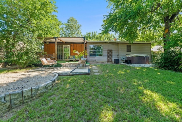 5105 Stone Gate Dr, Austin, TX 78721 - back of house featuring a hot tub, a patio area, and a yard