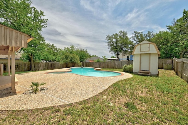 view of pool featuring a storage unit, a fenced backyard, an outdoor structure, and a patio area