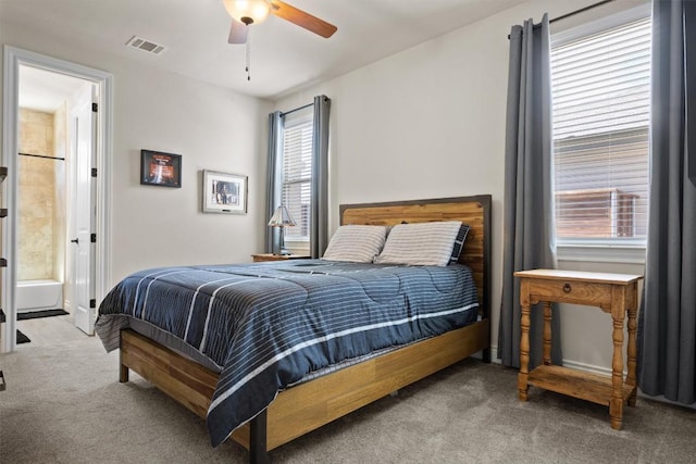 905 Indian Hawthorne Dr Unit G, Georgetown, TX 78628 - bedroom featuring carpet, ceiling fan, and ensuite bathroom