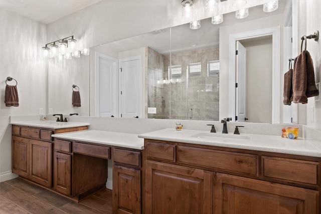 905 Indian Hawthorne Dr Unit G, Georgetown, TX 78628 - full bath featuring a shower stall, vanity, wood finished floors, and baseboards