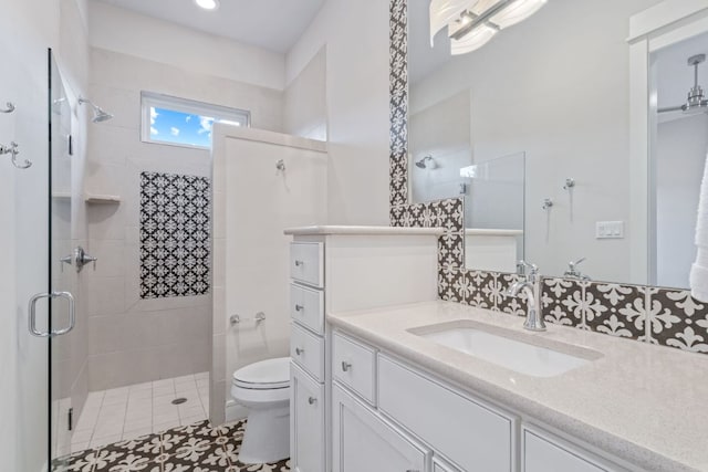 1107 Challenger, Lakeway, TX 78734 - full bathroom featuring vanity, a stall shower, and tile patterned floors