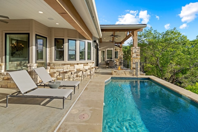 1107 Challenger, Lakeway, TX 78734 - outdoor pool featuring ceiling fan and a patio area