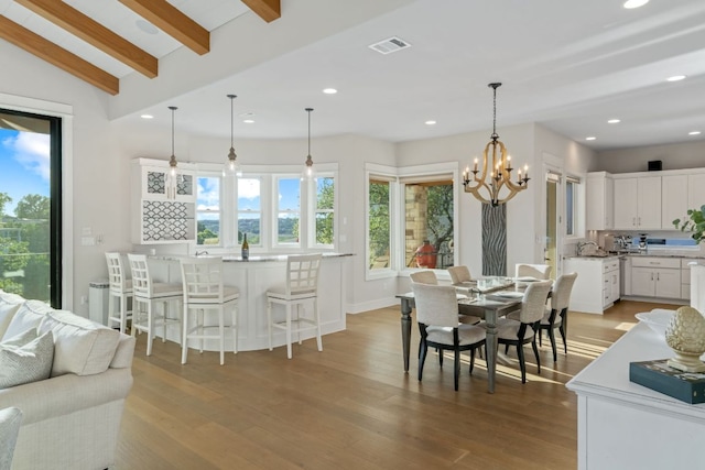 1107 Challenger, Lakeway, TX 78734 - dining space with a chandelier, light wood finished floors, and recessed lighting