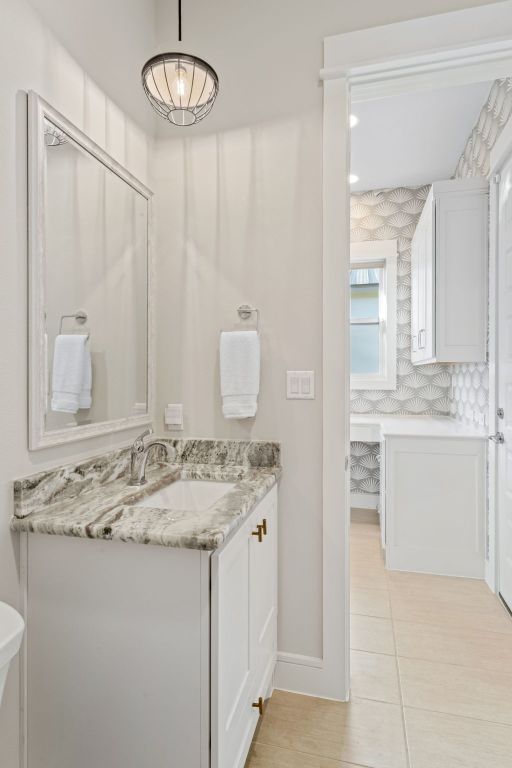 1107 Challenger, Lakeway, TX 78734 - bathroom with vanity and tile patterned flooring