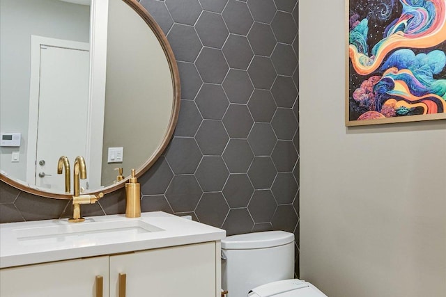 2010 Goodrich Ave Unit 5A, Austin, TX 78704 - half bath with vanity, tile walls, and toilet