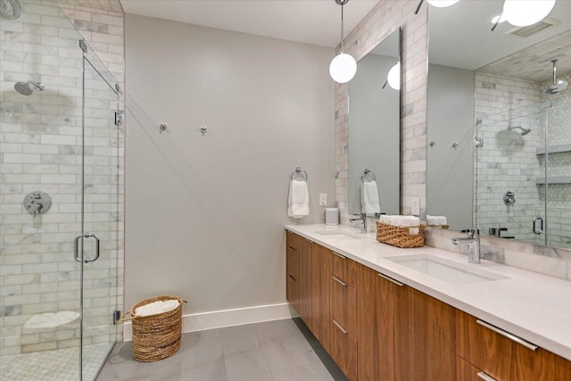2010 Goodrich Ave Unit 5A, Austin, TX 78704 - bathroom with double vanity, a stall shower, and baseboards
