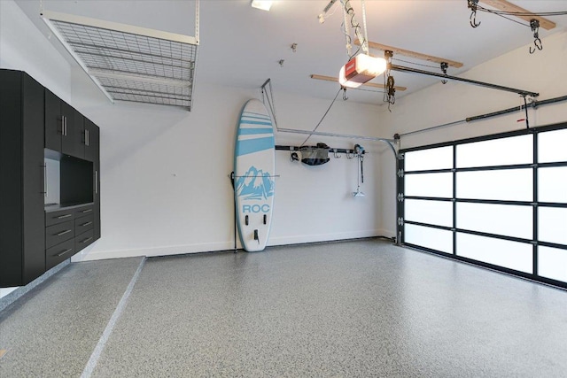 2010 Goodrich Ave Unit 5A, Austin, TX 78704 - garage with a garage door opener and baseboards