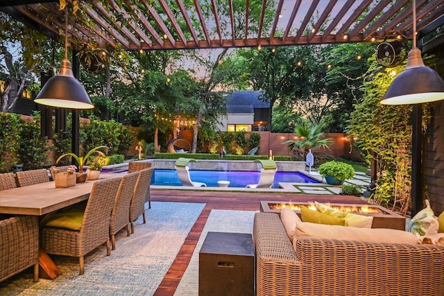 2010 Goodrich Ave Unit 5A, Austin, TX 78704 - fenced backyard featuring a fire pit, a pergola, and outdoor dining space