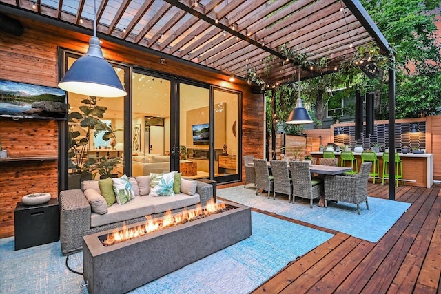 2010 Goodrich Ave Unit 5A, Austin, TX 78704 - wooden deck with a fire pit, a pergola, and outdoor dining area