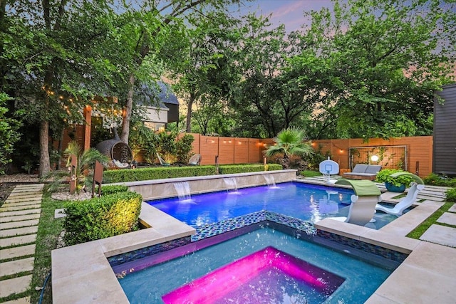 2010 Goodrich Ave Unit 5A, Austin, TX 78704 - view of swimming pool with an in-ground hot tub and a fenced backyard