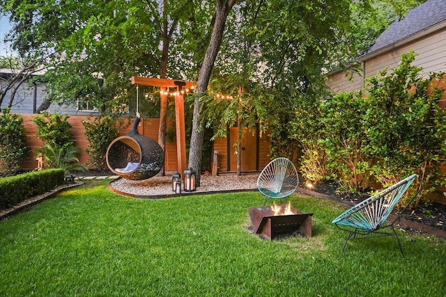 2010 Goodrich Ave Unit 5A, Austin, TX 78704 - view of yard featuring an outdoor fire pit