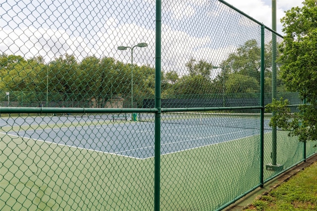 5219 Moon Shadow Dr, Austin, TX 78735 - view of tennis court featuring fence