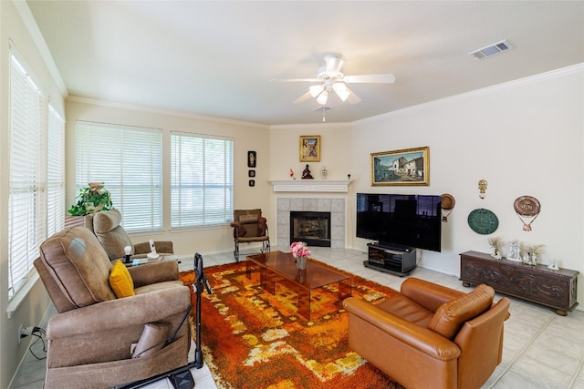 5219 Moon Shadow Dr, Austin, TX 78735 - living room featuring ceiling fan, ornamental molding, a fireplace, baseboards, and tile patterned flooring