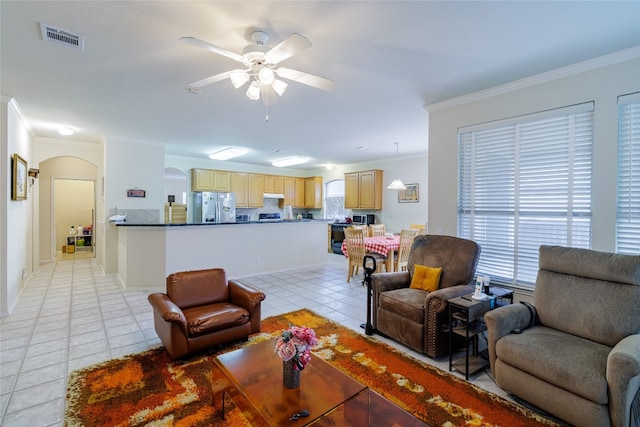 5219 Moon Shadow Dr, Austin, TX 78735 - living area featuring arched walkways, light tile patterned floors, a ceiling fan, and ornamental molding