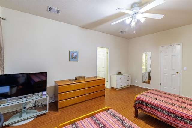 5219 Moon Shadow Dr, Austin, TX 78735 - bedroom with wood finished floors and a ceiling fan