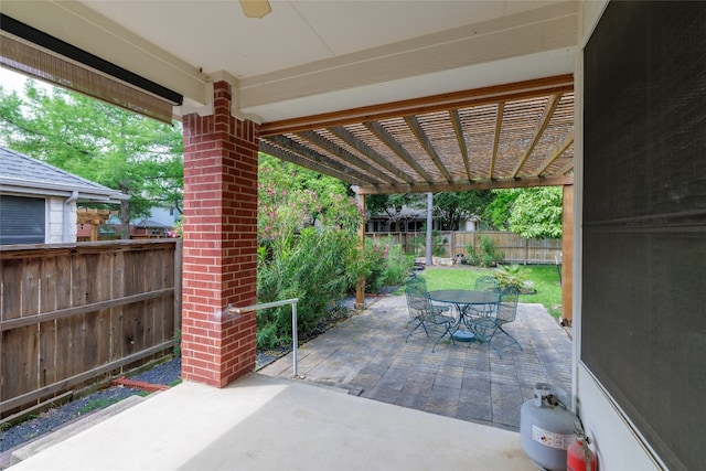 5219 Moon Shadow Dr, Austin, TX 78735 - view of patio / terrace with outdoor dining area and a fenced backyard