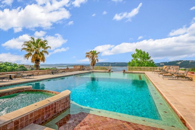 12861 Hughes Park Rd, Austin, TX 78732 - view of pool with a patio and a pool with connected hot tub