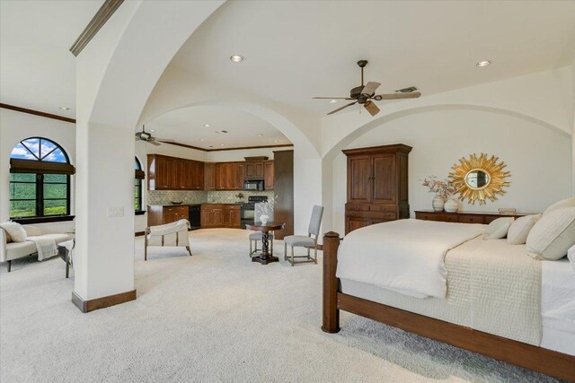12861 Hughes Park Rd, Austin, TX 78732 - bedroom with arched walkways, light colored carpet, recessed lighting, ornamental molding, and baseboards