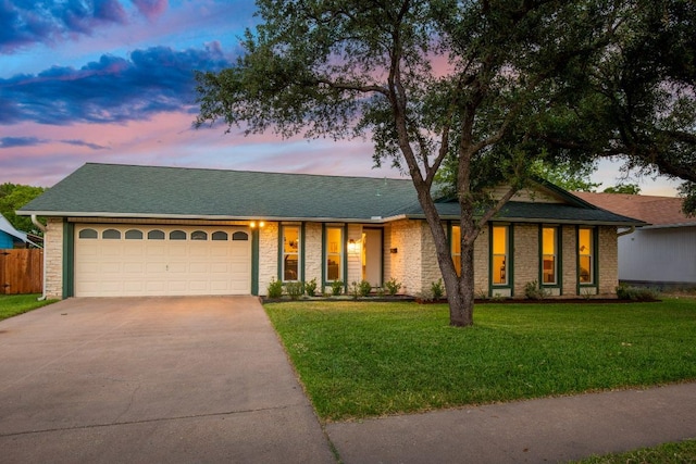 8907 Hunters Trce, Austin, TX 78758 - view of front of home featuring concrete driveway and an attached garage