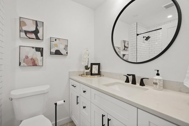 8907 Hunters Trce, Austin, TX 78758 - full bathroom featuring toilet, vanity, and tiled shower