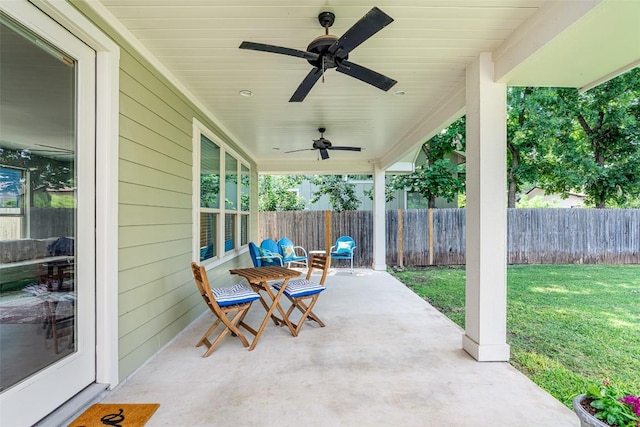705 E 49th St Unit A, Austin, TX 78751 - fenced backyard featuring ceiling fan and a patio