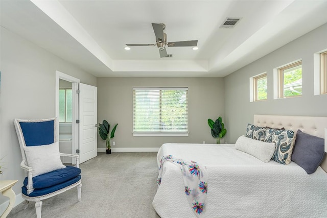 705 E 49th St Unit A, Austin, TX 78751 - bedroom featuring a raised ceiling, multiple windows, carpet flooring, recessed lighting, and a ceiling fan