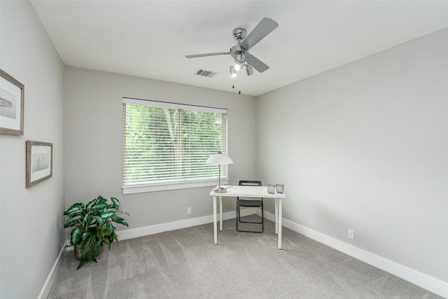705 E 49th St Unit A, Austin, TX 78751 - home office with a ceiling fan and carpet