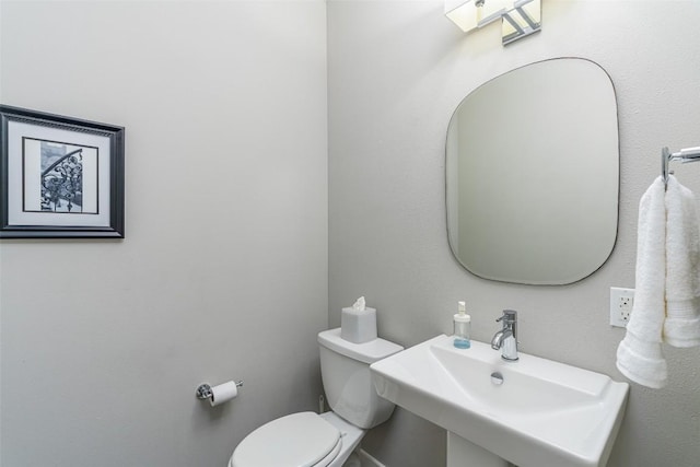 705 E 49th St Unit A, Austin, TX 78751 - half bath featuring a sink and toilet