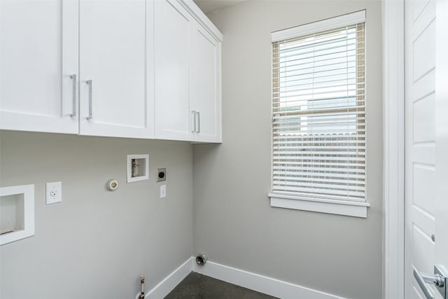 705 E 49th St Unit A, Austin, TX 78751 - washroom with hookup for a gas dryer, washer hookup, cabinet space, and electric dryer hookup