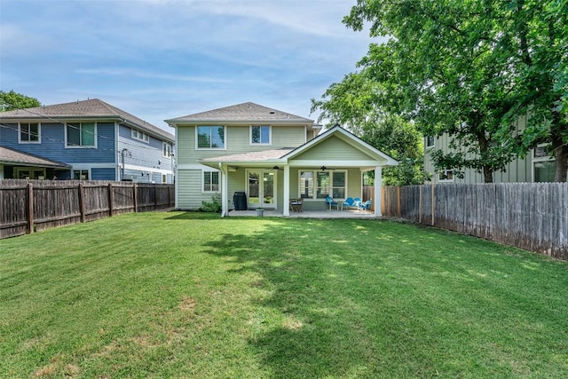 705 E 49th St Unit A, Austin, TX 78751 - rear view of house featuring a ceiling fan, a patio area, and a fenced backyard
