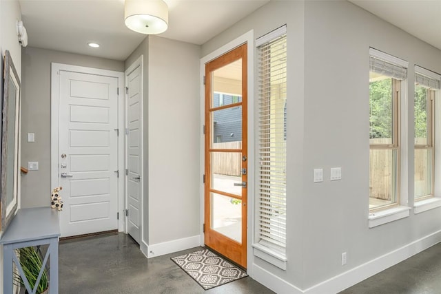 705 E 49th St Unit A, Austin, TX 78751 - foyer with finished concrete floors, plenty of natural light, and recessed lighting