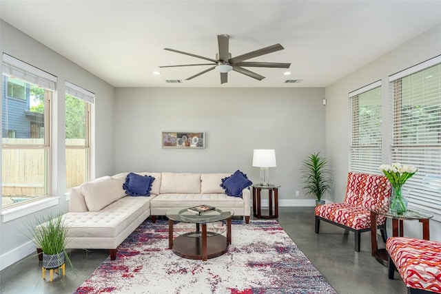 705 E 49th St Unit A, Austin, TX 78751 - living area with plenty of natural light, concrete flooring, a ceiling fan, and recessed lighting