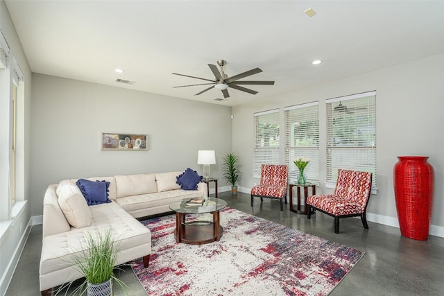 705 E 49th St Unit A, Austin, TX 78751 - living room featuring ceiling fan, recessed lighting, and concrete flooring
