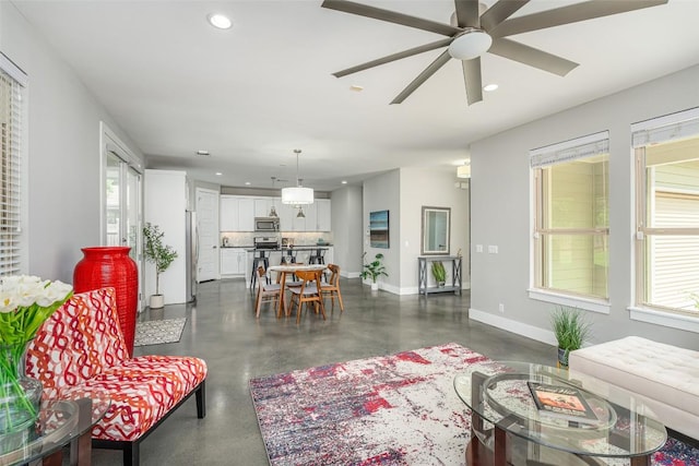 705 E 49th St Unit A, Austin, TX 78751 - living area with recessed lighting, concrete flooring, and ceiling fan