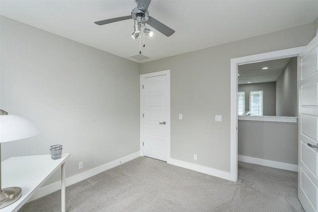 705 E 49th St Unit A, Austin, TX 78751 - unfurnished bedroom with carpet, a ceiling fan, and recessed lighting