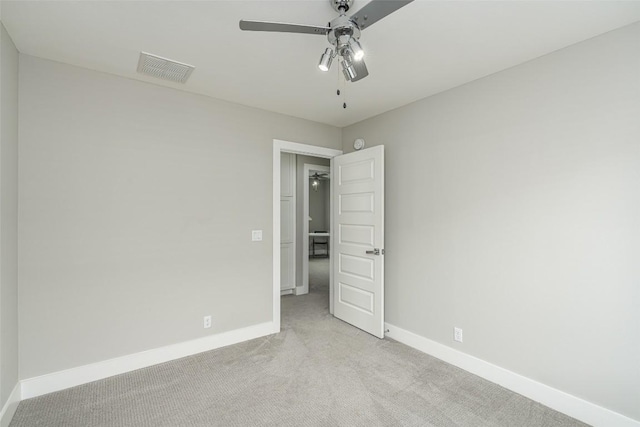 705 E 49th St Unit A, Austin, TX 78751 - unfurnished bedroom featuring light carpet and a ceiling fan
