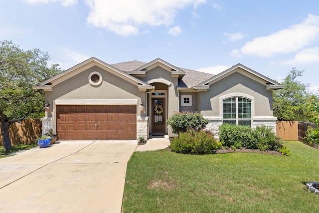 138 Prism Cv, Dripping Springs, TX 78620 - single story home featuring stucco siding, a garage, stone siding, and concrete driveway