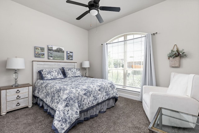 138 Prism Cv, Dripping Springs, TX 78620 - bedroom with dark colored carpet, ceiling fan, and baseboards