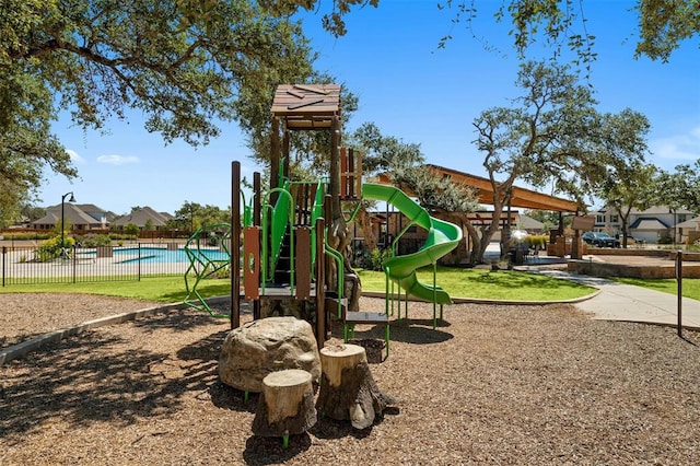 138 Prism Cv, Dripping Springs, TX 78620 - community jungle gym featuring fence