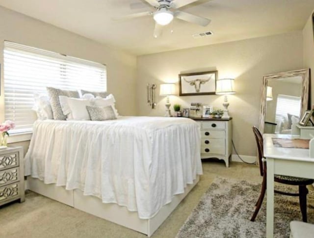 109 Ridgeview, Horseshoe Bay, TX 78657 - bedroom featuring light colored carpet and a ceiling fan