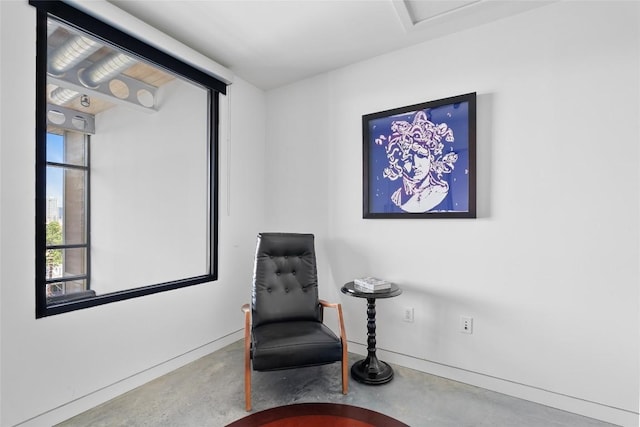 1401 Eva St Unit 406, Austin, TX 78704 - living area featuring concrete floors and baseboards
