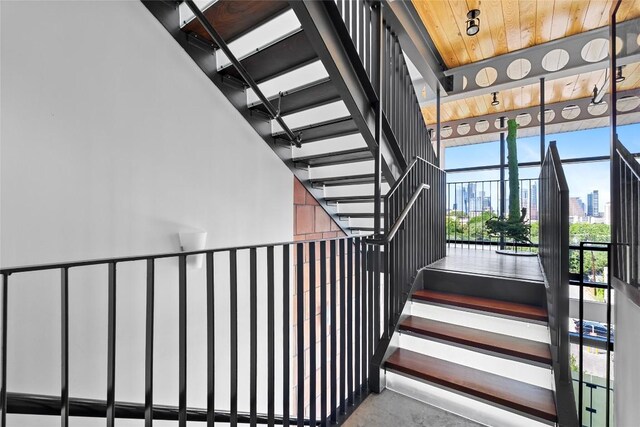 1401 Eva St Unit 406, Austin, TX 78704 - stairway featuring a view of skyline and concrete flooring