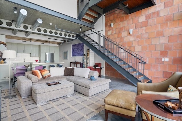 1401 Eva St Unit 406, Austin, TX 78704 - living room with stairway and light carpet