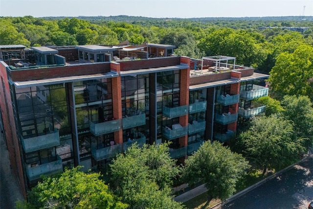 1401 Eva St Unit 406, Austin, TX 78704 - view of property featuring a wooded view